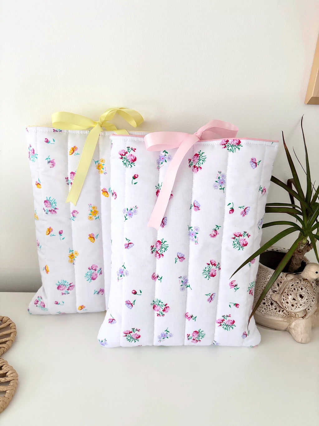 Pink floral quilted book sleeve