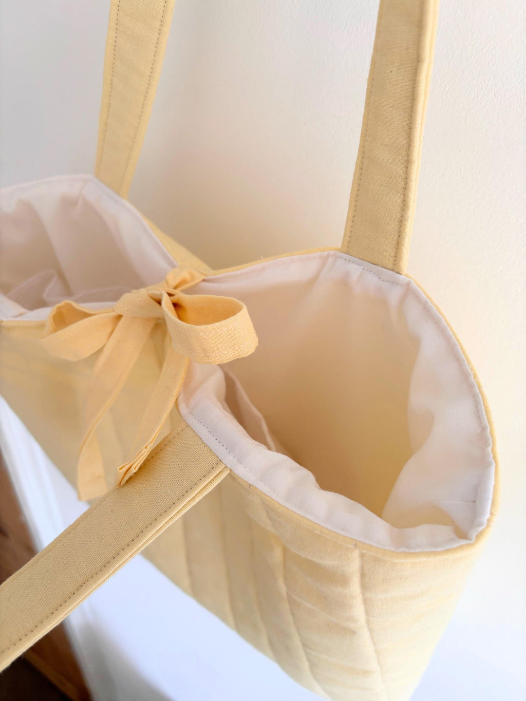 Butter yellow pastel quilted tote bag