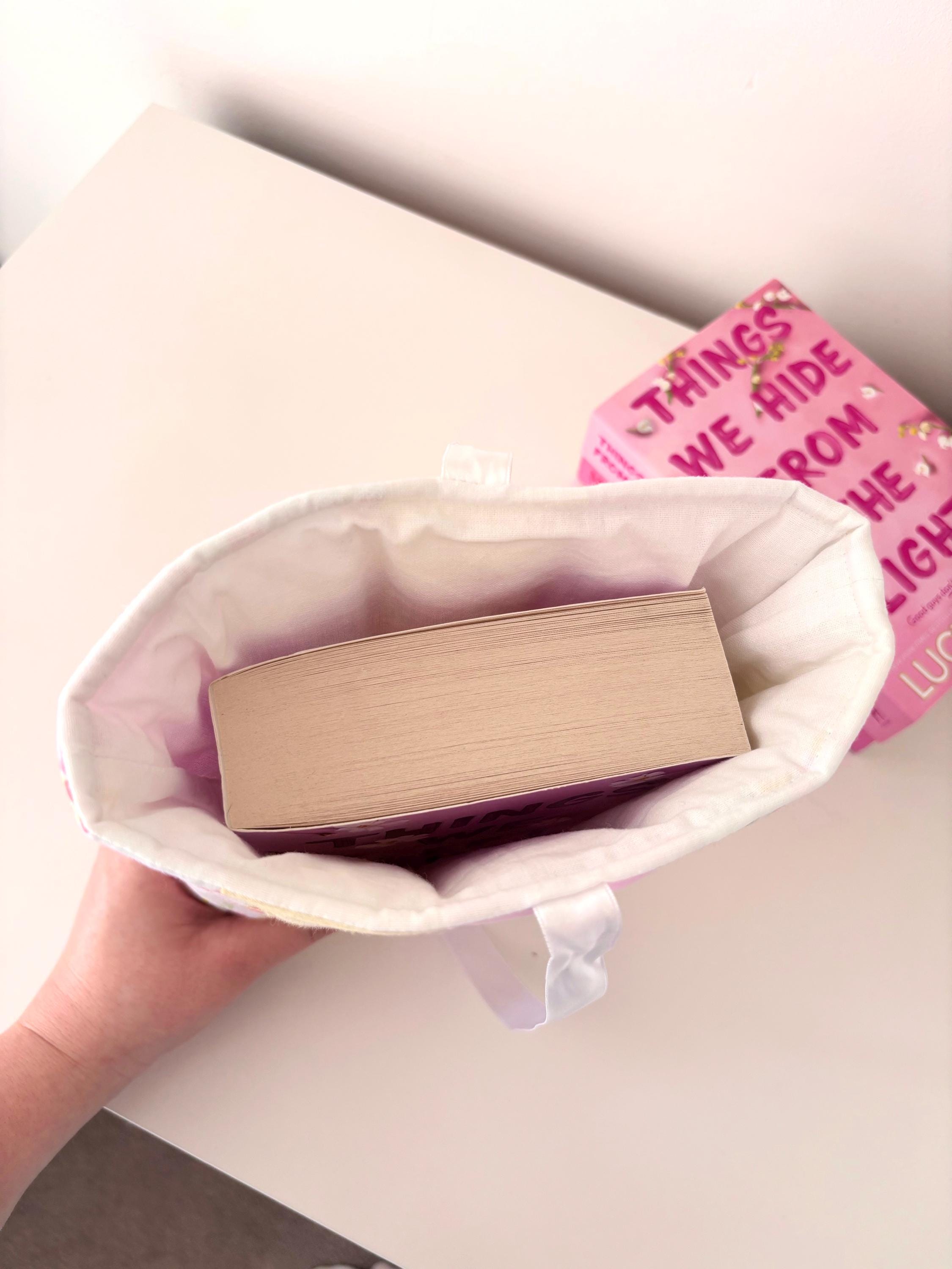 Pastel pink and yellow patchwork quilted book sleeve