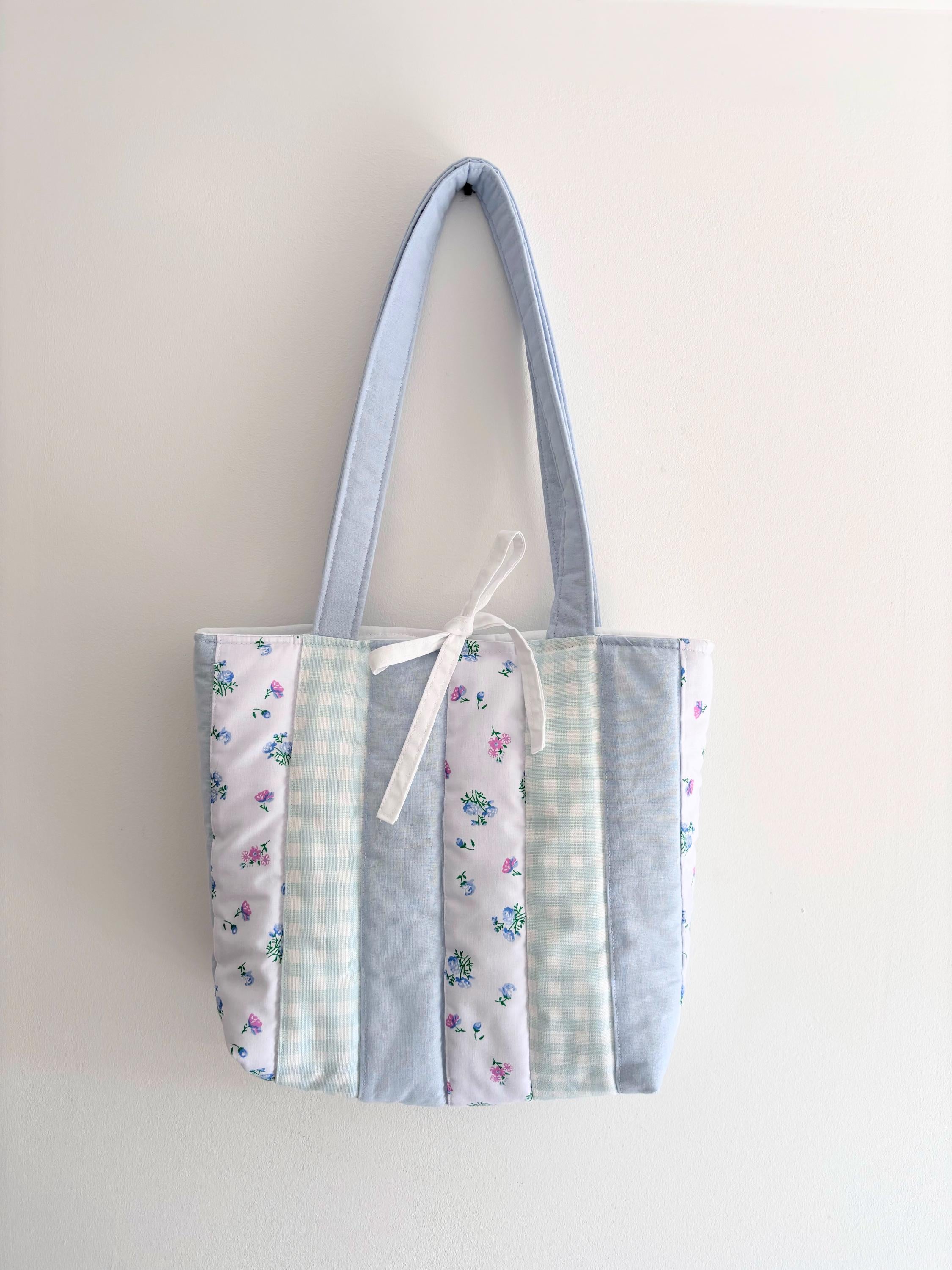 Pastel blue patchwork quilted tote bag