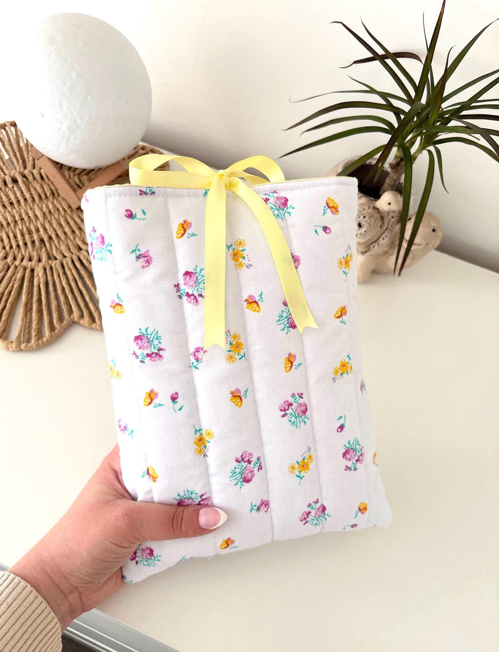 Yellow floral quilted book sleeve