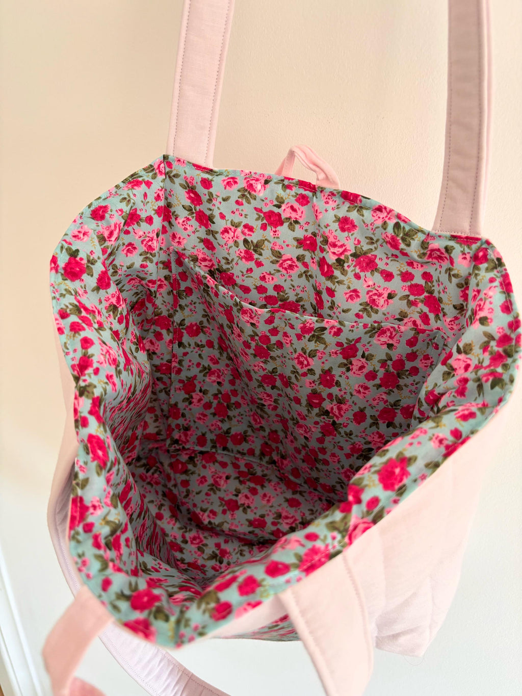 Pink floral quilted tote bag