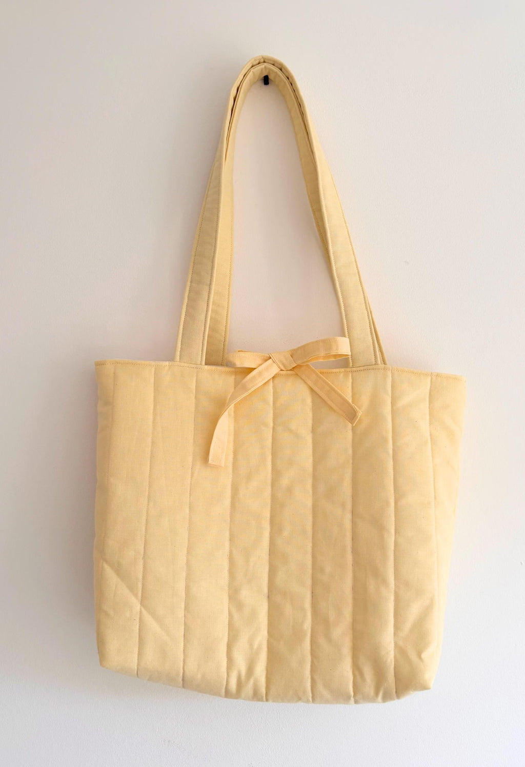 Butter yellow pastel quilted tote bag