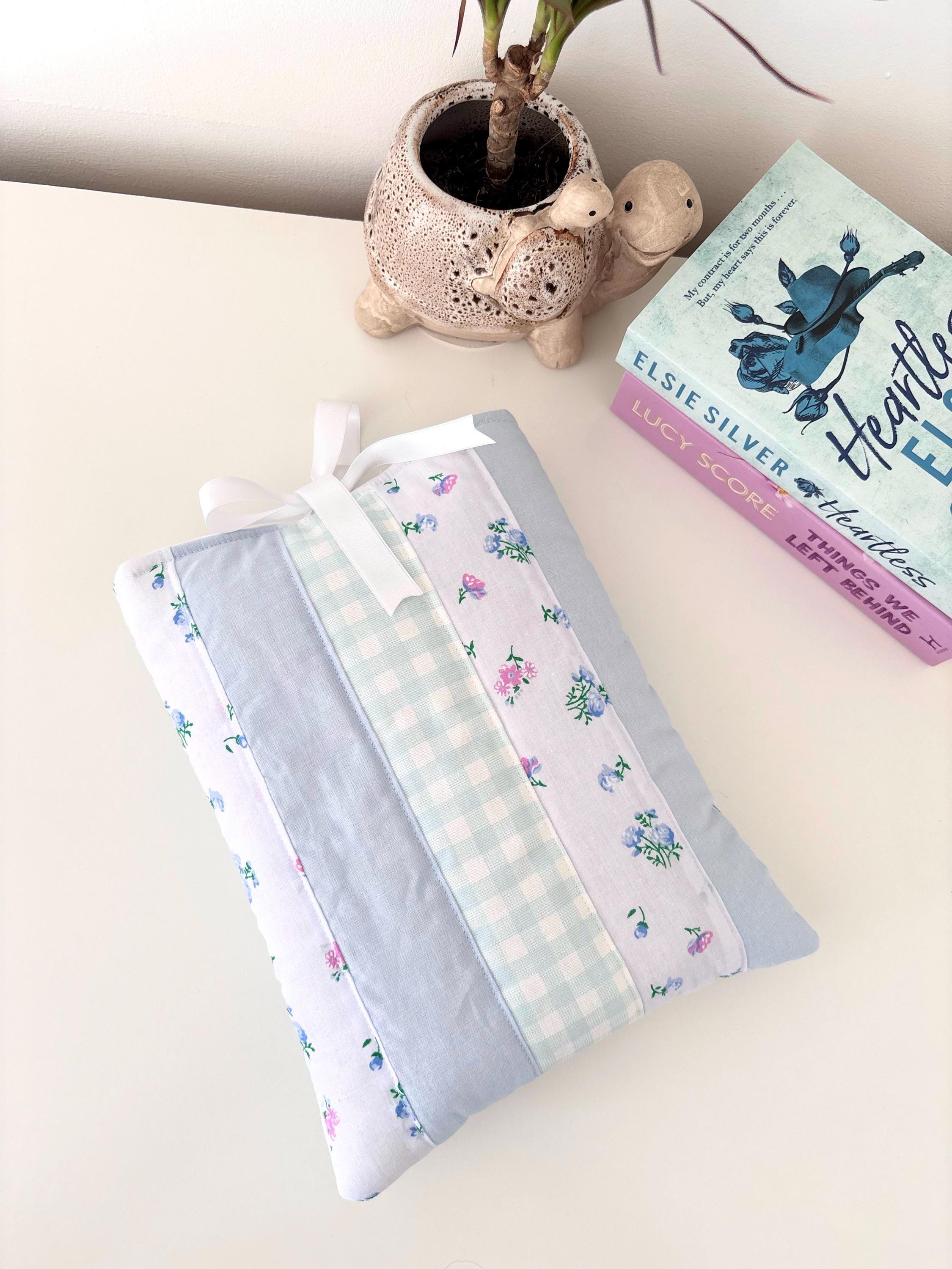 Pastel blue patchwork quilted book sleeve