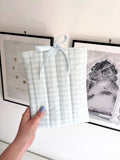 Pastel blue gingham book sleeve