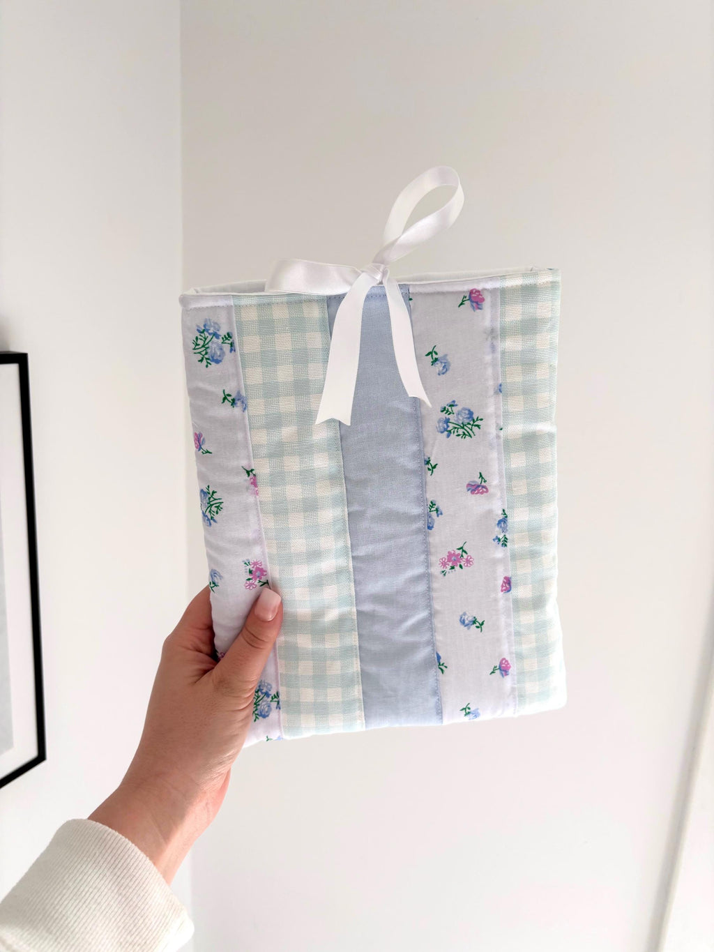 Pastel blue patchwork quilted book sleeve