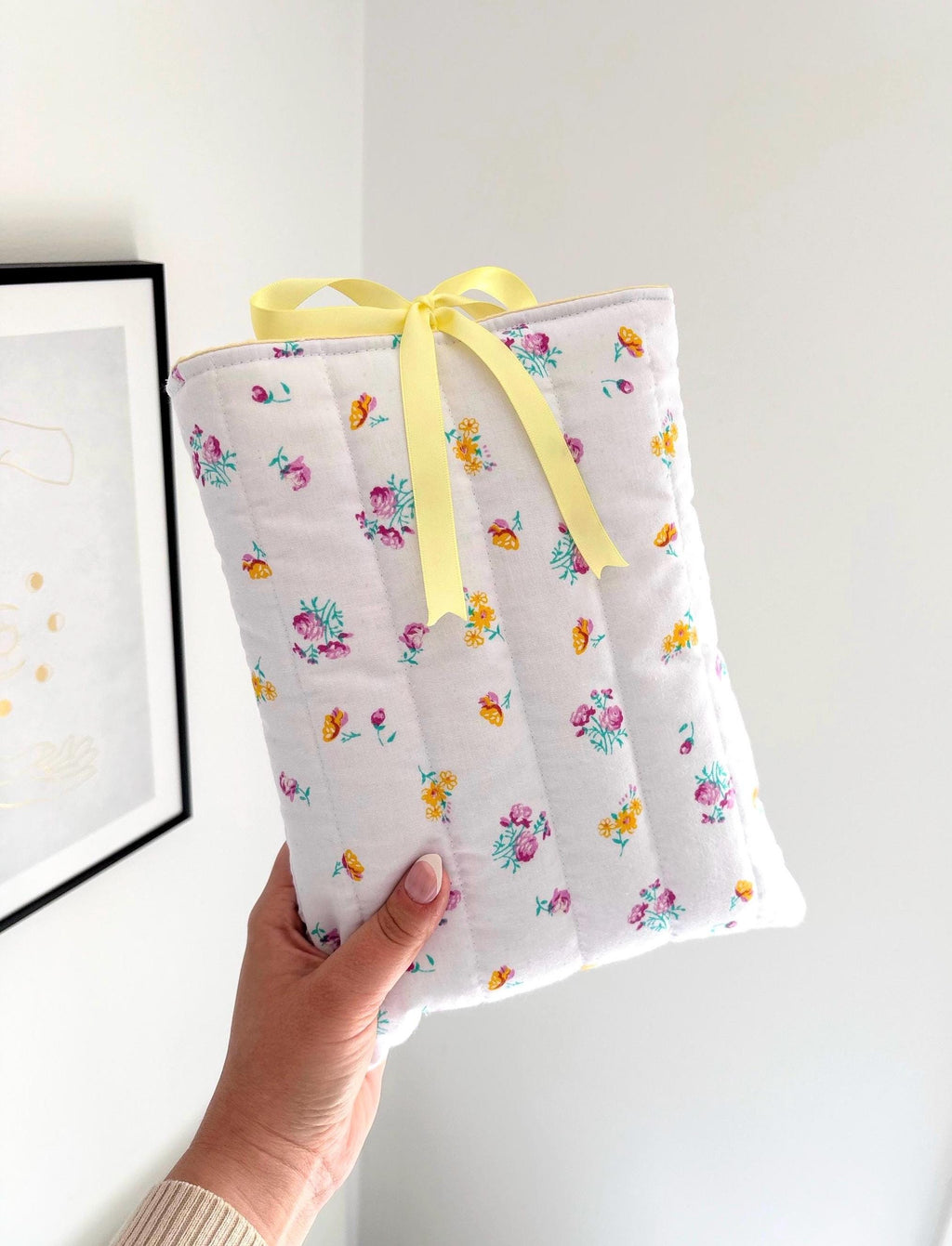 Yellow floral quilted book sleeve