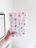 Pink floral quilted book sleeve