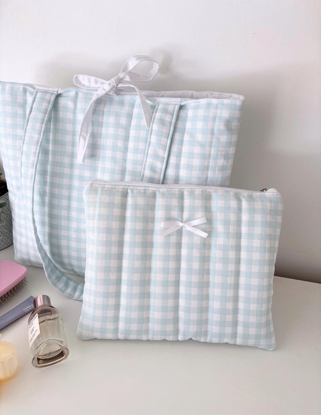 Pastel blue gingham quilted storage pouch
