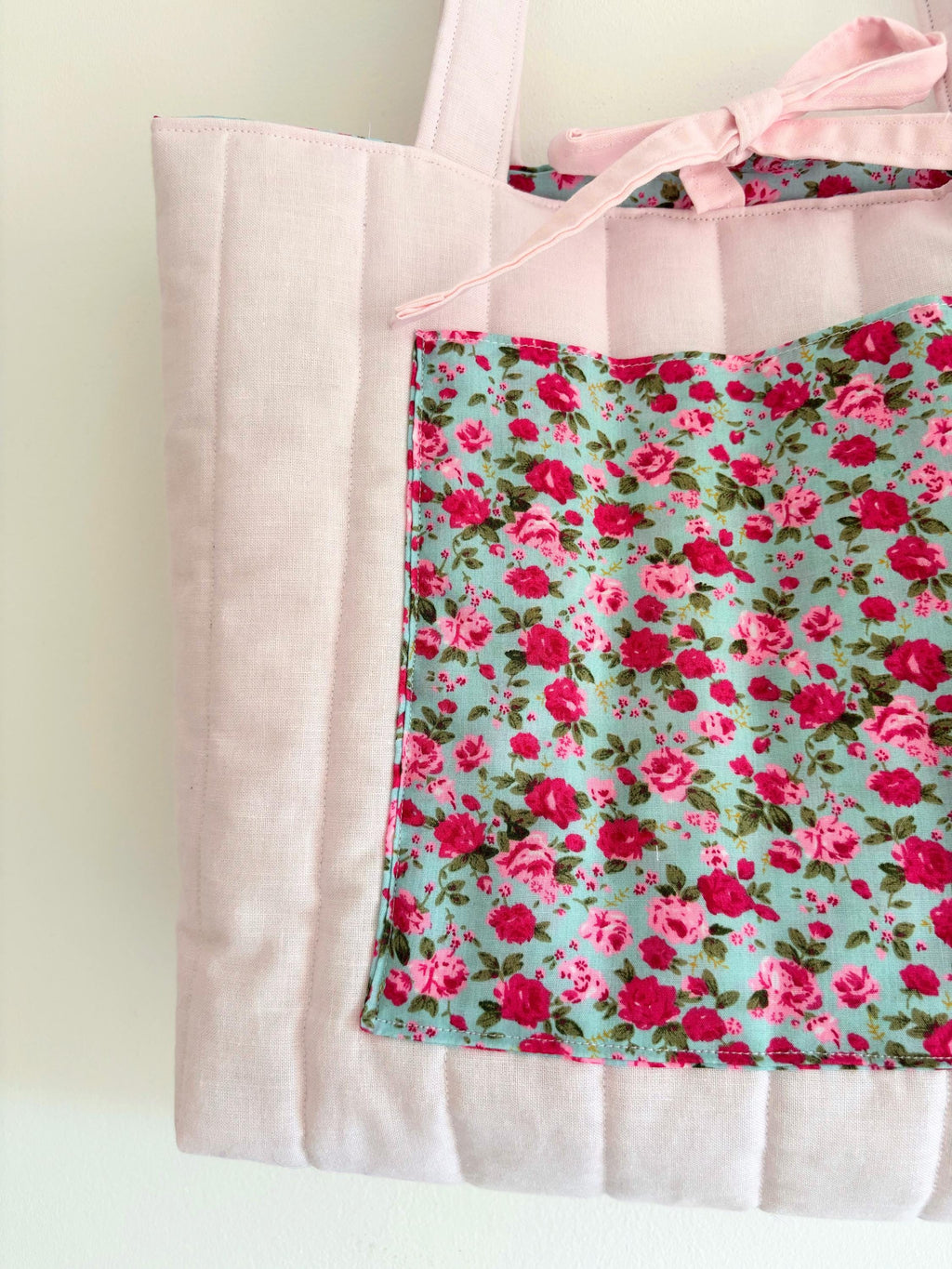 Pink floral quilted tote bag